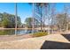 Scenic view of lake, gazebo and trees at 496 Spring View Dr, Woodstock, GA 30188