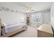 Charming bedroom with playful polka dot wall decor, light-colored wood furniture, and a bright window at 496 Spring View Dr, Woodstock, GA 30188