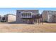 Rear elevation with deck and yard at 496 Spring View Dr, Woodstock, GA 30188