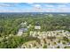 A beautiful aerial view of a home nestled in a community near I-85, with tree-lined streets at 6895 Smoke Ridge Dr, Atlanta, GA 30349