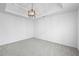 Dining room with tray ceiling and stylish pendant lighting at 6895 Smoke Ridge Dr, Atlanta, GA 30349