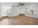 Spacious living area with wood floors and staircase access at 6895 Smoke Ridge Dr, Atlanta, GA 30349