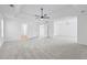Large main bedroom with tray ceiling that connects to bath and landing at 6895 Smoke Ridge Dr, Atlanta, GA 30349