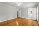 Bedroom featuring hardwood floors with view of ensuite bathroom at 1000 Grimes Bridge Rd, Roswell, GA 30075