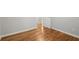 Bedroom with hardwood flooring, base trim and neutral walls at 1000 Grimes Bridge Rd, Roswell, GA 30075
