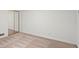 Bedroom featuring neutral carpet, sliding closet doors, and white walls at 1000 Grimes Bridge Rd, Roswell, GA 30075