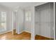 Cozy bedroom featuring closet and shuttered windows offering natural light at 1000 Grimes Bridge Rd, Roswell, GA 30075