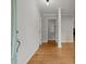 Light and airy foyer with hardwood flooring and decorative architectural columns at 1000 Grimes Bridge Rd, Roswell, GA 30075