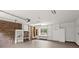 Spacious garage featuring brick walls, built-in shelving, and ample storage space at 1000 Grimes Bridge Rd, Roswell, GA 30075