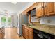 Functional kitchen with stainless steel appliances, granite countertops, and a stainless dishwasher at 1000 Grimes Bridge Rd, Roswell, GA 30075