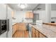 Functional kitchen with bright cabinets, ample countertop space, and modern appliances at 15 Ashton Pl, Covington, GA 30016