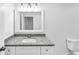 Bathroom with granite counters, modern sink and three-light vanity at 191 Davis Ct, Hiram, GA 30141