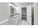 This bathroom has double sinks, granite counters, tile floors, and a tiled shower at 191 Davis Ct, Hiram, GA 30141