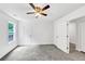 Bright bedroom with gray carpet, ceiling fan and white trim at 191 Davis Ct, Hiram, GA 30141
