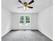 Bedroom with natural light, ceiling fan and gray carpet at 191 Davis Ct, Hiram, GA 30141