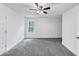 Bedroom with natural light, ceiling fan and gray carpet at 191 Davis Ct, Hiram, GA 30141