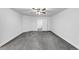 The bedroom is spacious and neutral with carpeted floors and a ceiling fan at 191 Davis Ct, Hiram, GA 30141
