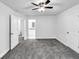 Bedroom featuring plush gray carpet and ensuite bathroom at 191 Davis Ct, Hiram, GA 30141