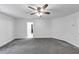 The bedroom has neutral carpet and paint and includes a ceiling fan at 191 Davis Ct, Hiram, GA 30141