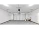 View of an empty two car garage with white walls and sealed concrete flooring, ready for use at 191 Davis Ct, Hiram, GA 30141