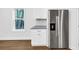 Stainless steel refrigerator with a window and white cabinets at 191 Davis Ct, Hiram, GA 30141