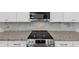 Close up of electric stovetop and granite countertops in kitchen at 191 Davis Ct, Hiram, GA 30141