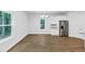 Open living area with view into the kitchen and backyard at 191 Davis Ct, Hiram, GA 30141