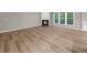 Living room with fireplace and an abundance of natural light at 220 Finchley Dr, Roswell, GA 30076