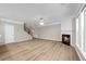 Spacious living room featuring a cozy fireplace and an open floorplan at 220 Finchley Dr, Roswell, GA 30076