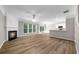 Open living room with fireplace, great natural light, and neutral tones at 220 Finchley Dr, Roswell, GA 30076
