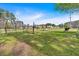 Sprawling backyard featuring a vast expanse of grass and mature trees at 2767 Camp Mitchell Rd, Loganville, GA 30052