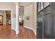 Inviting home entryway with hardwood floors, neutral walls, and an open view to the living room at 2767 Camp Mitchell Rd, Loganville, GA 30052