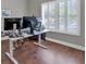 Comfortable home office with natural light and wood flooring at 2767 Camp Mitchell Rd, Loganville, GA 30052