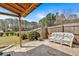 Inviting patio featuring an outdoor sofa and well-maintained garden at 2767 Camp Mitchell Rd, Loganville, GA 30052