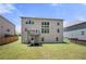 Exterior of home with a large backyard and a wooden deck at 5465 Mirror Lake Dr, Cumming, GA 30028