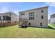 Exterior of home with a large backyard and a wooden deck at 5465 Mirror Lake Dr, Cumming, GA 30028