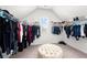 Spacious walk-in closet with ample hanging space and natural light at 5465 Mirror Lake Dr, Cumming, GA 30028