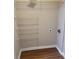 Small closet with wire shelving and a wooden floor at 1103 Waldrop Pl, Decatur, GA 30034