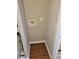 Small laundry room with hookups and wood-look flooring at 1103 Waldrop Pl, Decatur, GA 30034
