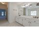 Bright bathroom with white cabinets and jacuzzi tub view at 1730 Point Pleasant Se, Smyrna, GA 30080