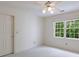 Airy bedroom with neutral tones, plush carpet, and many windows at 1730 Point Pleasant Se, Smyrna, GA 30080