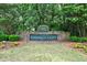 Welcoming entrance to Vinings Glen with stone signage and beautiful landscaping at 1730 Point Pleasant Se, Smyrna, GA 30080