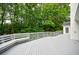 Charming deck with built-in seating provides a serene space to enjoy the surrounding nature at 1730 Point Pleasant Se, Smyrna, GA 30080