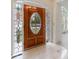 Elegant foyer featuring marble flooring and a decorative stained glass front door with sidelights at 1730 Point Pleasant Se, Smyrna, GA 30080