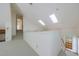 Hallway with a view of the stairs leading to the bonus room at 1730 Point Pleasant Se, Smyrna, GA 30080
