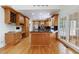 Spacious kitchen with wood cabinets, island, granite countertops and stainless steel appliances at 1730 Point Pleasant Se, Smyrna, GA 30080