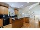Spacious kitchen has wood cabinets, granite countertops, a kitchen island and lots of light at 1730 Point Pleasant Se, Smyrna, GA 30080