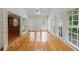 Bright sunroom with hardwood floors and large windows offering natural light at 1730 Point Pleasant Se, Smyrna, GA 30080