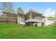 Backyard featuring a house, grass, and privacy fence at 2757 Shelley Ln, Ellenwood, GA 30294