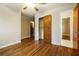 Bedroom featuring hardwood floors, closet, and natural light at 2757 Shelley Ln, Ellenwood, GA 30294